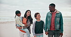 Family, face and happy on beach with walking, love and bonding on vacation, travel or adventure by ocean. Interracial, parents and kids at sea for experience, relationship or holiday, care and smile