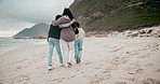 Family, beach and walking with hug, love and care together with mom back and children. Young girls, kids and relax with travel, vacation and ocean with adventure outdoor with bonding and support