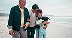 Beach, love and grandparents with kids by sea for bonding, relationship and relax in nature. Family, travel and grandfather, grandmother and children by ocean on holiday, vacation and adventure