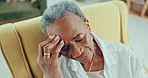 Stress, headache and sad senior black woman in a chair with memory or depression at nursing home. Anxiety, face and elderly African lady person in living room with dementia, Alzheimer or vertigo 