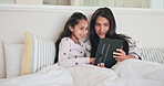 Mom, kid and girl with tablet in bed for online games, download multimedia and reading ebook story. Happy mother, child and communication for elearning, streaming digital cartoons and movies at home