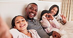 Family, selfie or smile on bed in bedroom of home for bonding, care and relaxing with love or joy. Interracial, parents or girl children with photo memory, comic or peace with resting in the morning