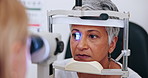 Eye care, laser test and woman in office with doctor to check iris, pupil and sight. Machine for vision exam, light and mature patient in clinic for assessment for glasses, lens or glaucoma treatment