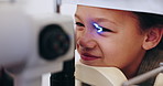 Healthcare, ophthalmology and child with equipment for eye test in optometrist office for glasses, vision or eye care. Face, little girl or kid with consult for myopia, glaucoma or correction lens