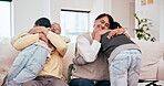 Family, grandparents and children hug or happy on the sofa in a living room of their home for visit. Portrait of a senior man and women with kids on a couch with a smile, love and excited or care
