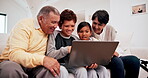 Family, grandparents and children on laptop or happy together on the sofa in a living room of their home for visit. Portrait of a senior man and women with kids and internet for elearning or games