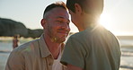 Dad, child and hug at beach with sunset, sunlight or happiness for vacation, bonding or holiday in Cape Town. Family, man and boy with smile or embrace on ocean or sea for relationship, love and care