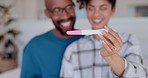 Happy couple, smile and bedroom with pregnancy test, positive and bed with surprise, results and excited. Man, woman and baby with stick, love and maternity for future family and celebrate together
