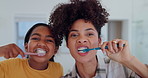 Mother, daughter and brushing teeth for dental hygiene, oral health and wellness, bathroom and support. Happy family, toothbrush and smile or laughing, clean and fresh breath or mouth, care and joy