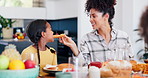 Mother, kid or lunch with food at table, for dessert or diet with happiness in family home together. Feeding daughter, parent or girl child with mom eating waffles, snack or meal for dinner for care