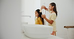Bathroom, kids and brushing hair with girls, morning and happiness with grooming, routine and bonding together. Home, sisters and children with a brush, conversation and help with style, care or love