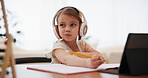 Writing, homework and girl with tablet and headphones for education, online learning and studying in home. School, virtual classroom and child with digital tech for knowledge, internet and project