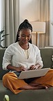 Couch, laptop and typing with black woman, smile and email with internet, connection or website info. Writer, African person or entrepreneur with a pc, copywriting or online reading with idea or home