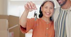 Couple, new home and keys in hand, smile and hug with excited face, investment and success in real estate. Man, woman and happy in portrait for pride, boxes or moving for property, house or apartment