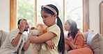 Sad, child and parents in a fight and teddy bear for comfort, support or care in divorce argument. Depressed, kid and hearing angry mom and dad fighting in living room with trauma, fear or anxiety