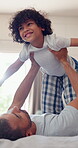 Father, child and airplane arms in home for play connection, childhood fun or morning routine together. Man, son and bed for flying fantasy game or trust activity, balance lift or parenting bonding