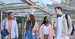 Students, group and happy on walk at university with diversity, funny conversation or chat in sunshine. Men, women and friends with comic joke, story or college for education, learning and studying