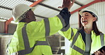Team building, high five and construction with people in a warehouse for motivation or support. Diversity, support and an engineer team together in a plant or factory for a manufacturing achievement