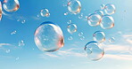 Bubbles floating in blue sky as wallpaper, decor and background. Abstract motion concept for freedom, fun and entertainment. Happy invitation with clouds, movement and reflection.