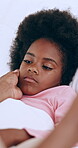 Mother, child, or touch cheek in bed, comfort or monitor wellness in family home with communication. Black woman, daughter and care with love in worry, concern and support sick or sad kid in house

