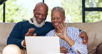 Laptop, video call and senior black couple on a sofa waving for greeting in the living room at home. Technology, online and elderly man and woman in retirement on virtual conversation with computer.