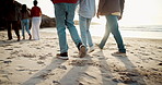 Sunset, walking and family on the beach for travel vacation, holiday or weekend trip together. Evening, sand and closeup of people on the sand by the ocean or sea for tropical getaway on an island.