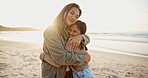 Mother, child and hug on beach happy for parent connection, kid love development or relax vacation trip. Woman, girl and sunset embrace for calm together or ocean sand or tropical, travel or sunshine