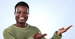 Face, smile and man with hand pointing in studio for news, announcement or platform space on blue background. Happy, portrait and African male model show mockup for service, launch or promo offer