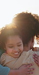 Running child, hug and mother and daughter at a beach with love, happy and excited for reunion, freedom or vacation. Family, face and girl kid embrace mama in nature with support, security or bond