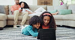 Children, tablet or gaming with a brother and sister on the living room floor together for bonding. Family, technology or entertainment with boy and girl kids in their home while parents relax