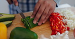 Cooking, healthy food and hands with knife in a kitchen with vegetables, avocado and health meal prep. Person, diet and lunch in a home with salad, cutting wood board and chop for dinner in a house