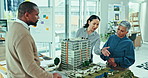 Business people, model and architecture design in office for city planning, development or project teamwork. Group engineering, manager or designer in collaboration with 3d building and eco prototype