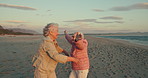 Senior women, friends and hug by sea with hands in air, applause and excited for reunion at beach. Elderly lady, people and embrace with smile, happy and freedom on vacation, walk and retirement