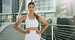 Woman, fitness and confidence in city for workout, running or outdoor training in health and wellness. Portrait of serious or confident female person, runner or athlete for exercise in urban town