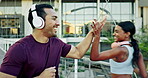 High five, runner or happy man in city for fitness training, exercise or cardio workout on outdoor bridge. Greeting, friends or sports athlete with joy or motivation for running on urban street road