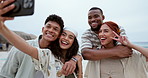 Friends, beach selfie and excited with smile, hug and happy couple with peace sign for blog on vacation. Men, women and gen z people with diversity, holiday or laugh for photography for social media