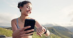 Woman, phone and smartwatch in nature for fitness, workout and exercise data, health or wellness app. Young person with timer or stopwatch and mobile data for training progress or results on mountain