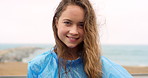 Happy young woman smiling while on holiday