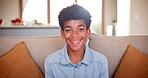 Boy, face and relaxing on couch on weekend, living room and happy or comfortable at home. Black male person, kid and smiling in portrait on vacation or holiday, laughing and humor or funny joke