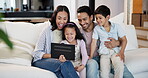 Love, smile and selfie with tablet on sofa of living room in home together for weekend bonding. Technology, photograph or funny face with mother, father and children taking picture in apartment