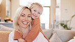 Mother, child and loving hug or face, bonding and affection in relationship or security and care. Mommy, daughter and portrait in living room and family relaxing in embrace, comfort and smile at home