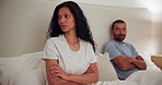 Angry, woman and couple with conflict in bedroom of home with fight in marriage for divorce. Person, thinking and frustrated with man for erectile dysfunction, problem or mistake in relationship