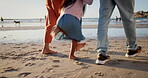 Parents, child and feet on beach or together on sand for holiday vacation for adventure, summer or bonding. People, kid and toes by ocean water for morning walk or journey for relax, trip or explore