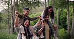 Mother, father and children on shoulders for hiking adventure path for exercise, trekking or travel. Parents, kids and carrying rest in forest or healthy walking for explore nature, trip or cardio