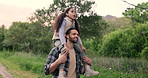 Nature, smile and child on shoulders of father for hiking adventure in outdoor forest together. Happy, care and young dad carrying girl kid for trekking or walking in the woods on weekend trip.