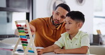 Father, son and counting on abacus in home, learning numbers and love in child development in kindergarten. Man, kid or educational toys in preschool mathematics in care, lesson or bonding in house