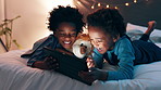 Children, siblings and tablet in bed, night or happy for movie, funny video or comic meme in house. African kids, bedroom or streaming subscription on digital touchscreen, cartoon show or family home