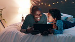 Night, tablet and father and son on a bed with cartoon, movie or streaming funny video at home. Digital, app and black dad with kid in a bedroom for online comic, love and bonding in a house together