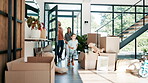 Family moving, new home and children running with parents excited for mortgage and real estate. Happy father, mother and kids walking in front door with boxes for dream house, property and investment