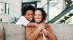 Happy mother, child and hug on sofa for love, support or care in fun bonding, holiday or weekend together at home. Portrait of African mom, kid or son smile for embrace or relax on living room couch